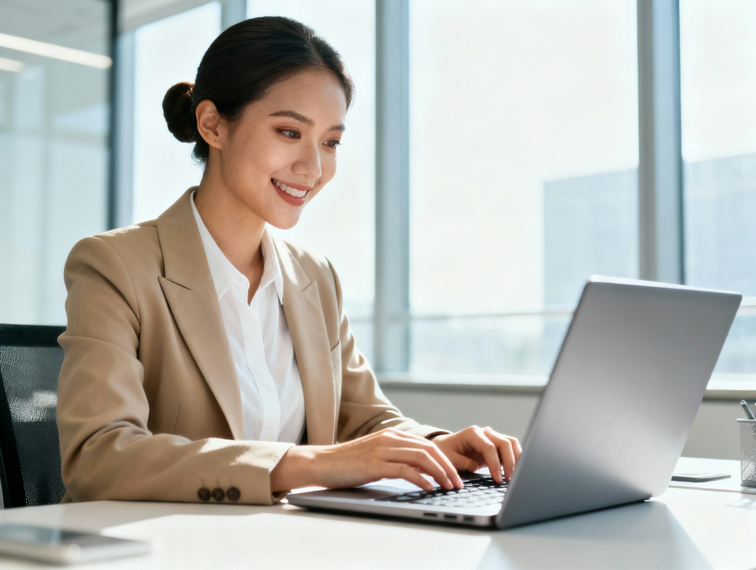 An independent sales representative focused on their laptop, efficiently managing their workflow and leveraging digital tools to close deals remotely.