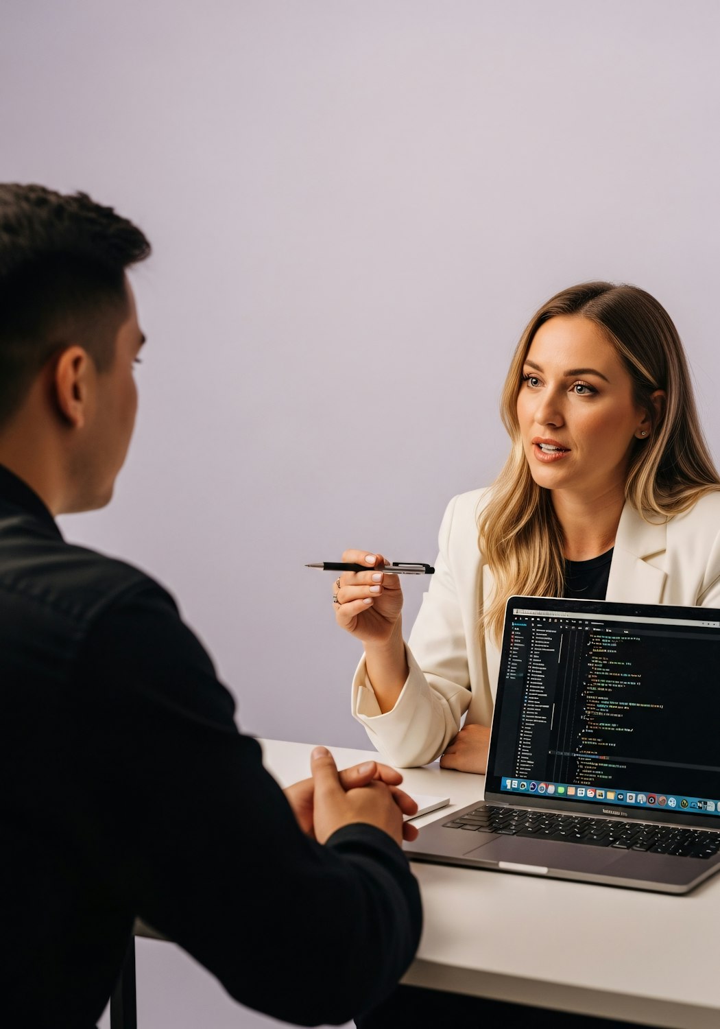 An Enterprise SaaS Sales Representative presenting complex software solutions to business clients.